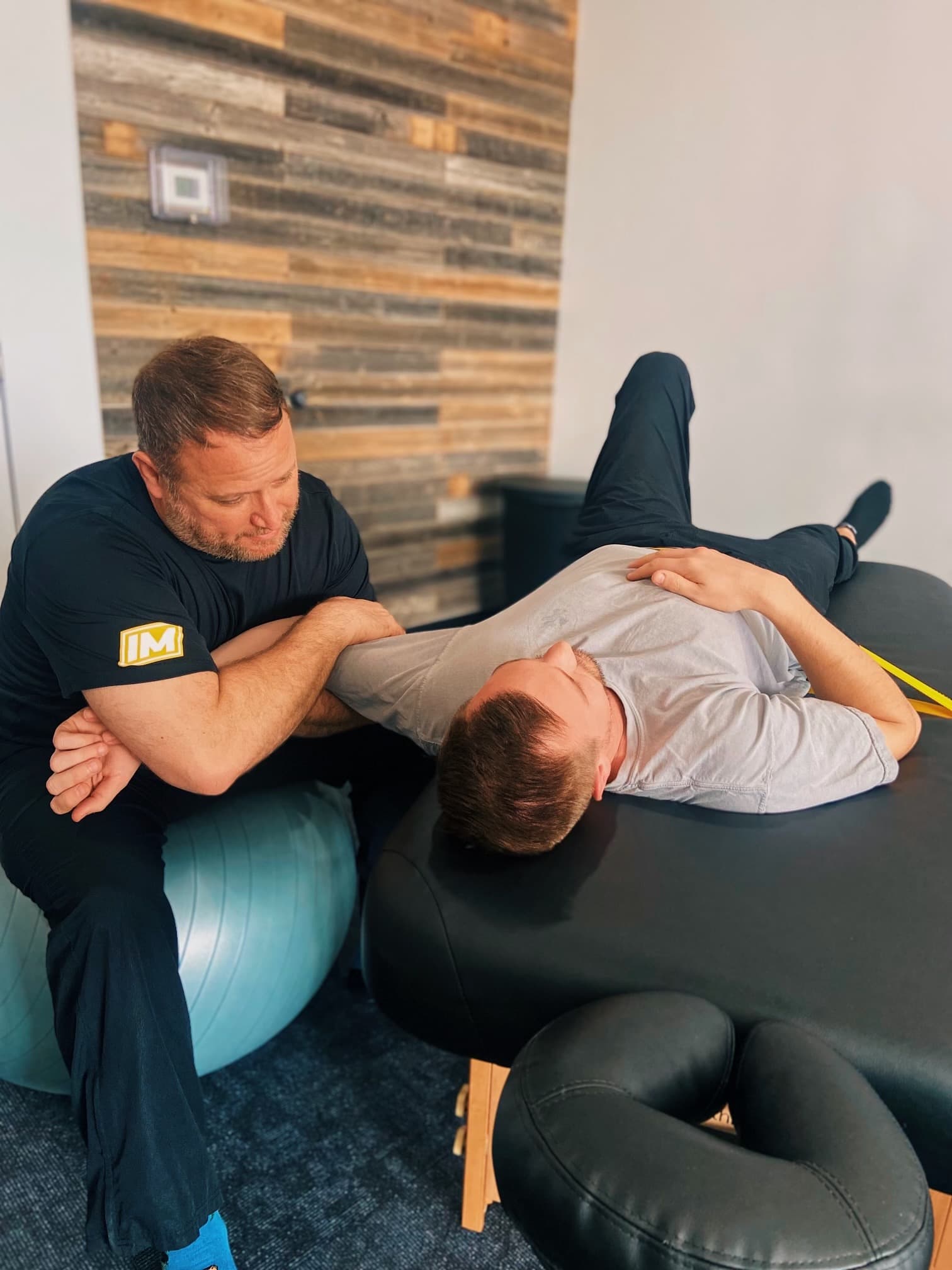 Assisted stretching session at InMotion Wellness Studio Burlington