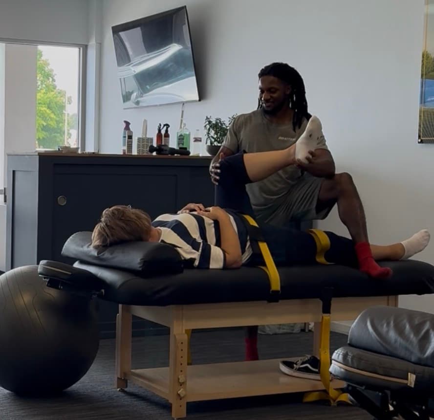 Assisted stretching session at InMotion Wellness Studio Spartanburg